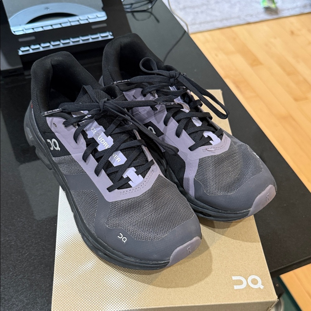 On Running Women’s Cloudrunnner Black and Purple Athletic Shoes